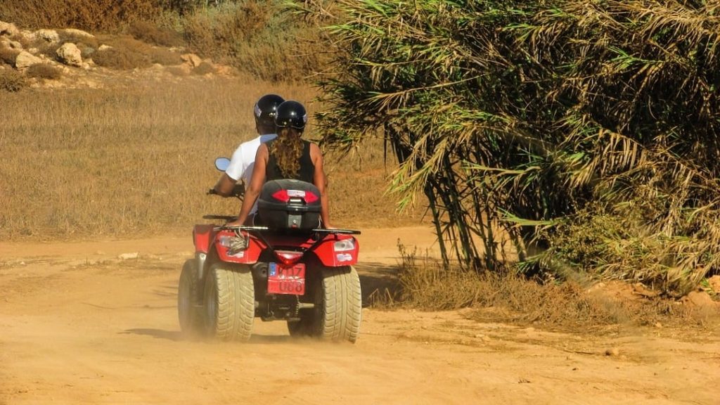 Couple on a quad bike