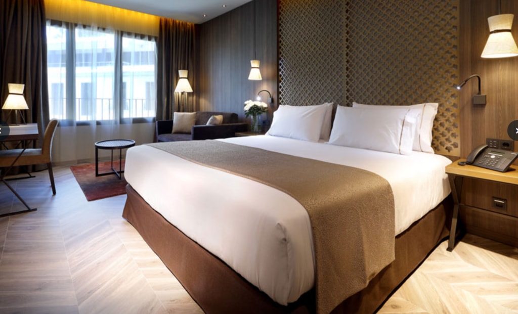 Bed in Suite at Aurea Washington Irving Eurostar hotel in Granada