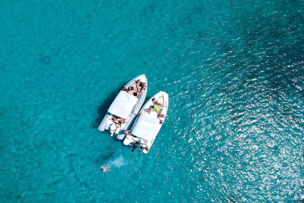 Boat tips in clear waters
