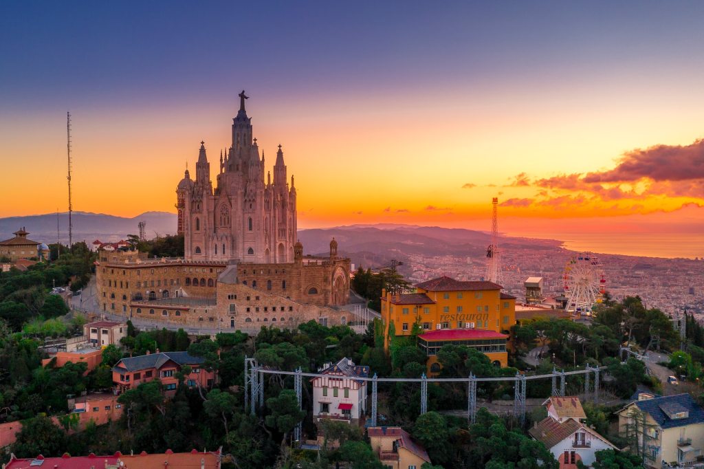 Cathedral on a hill at sunset in Barcelona, Spain