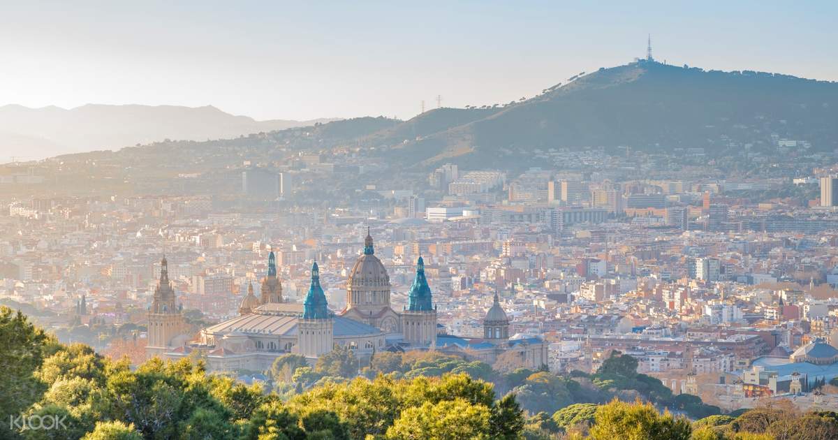 Evolution of Barcelona E-bike Tour with Montjuic Castle Visit