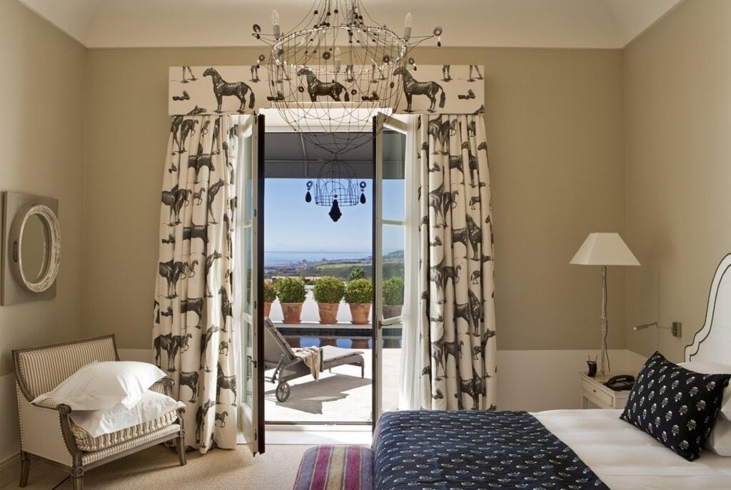 Hotel room of Finca Cortesin in Spain with white and black accents
