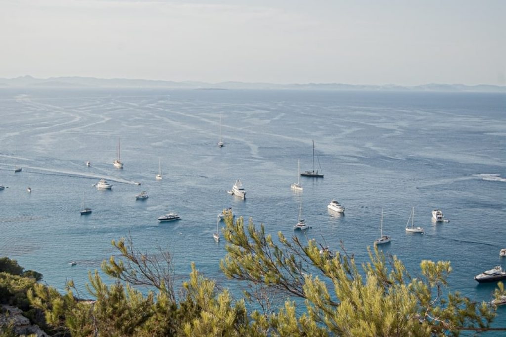 boats floating in mediterrean sea