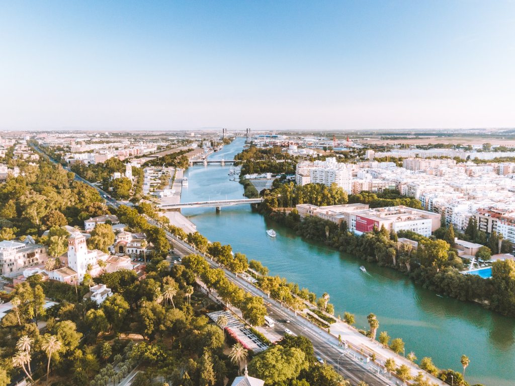 Lake in Seville, Spain surrounded by buildings and nature