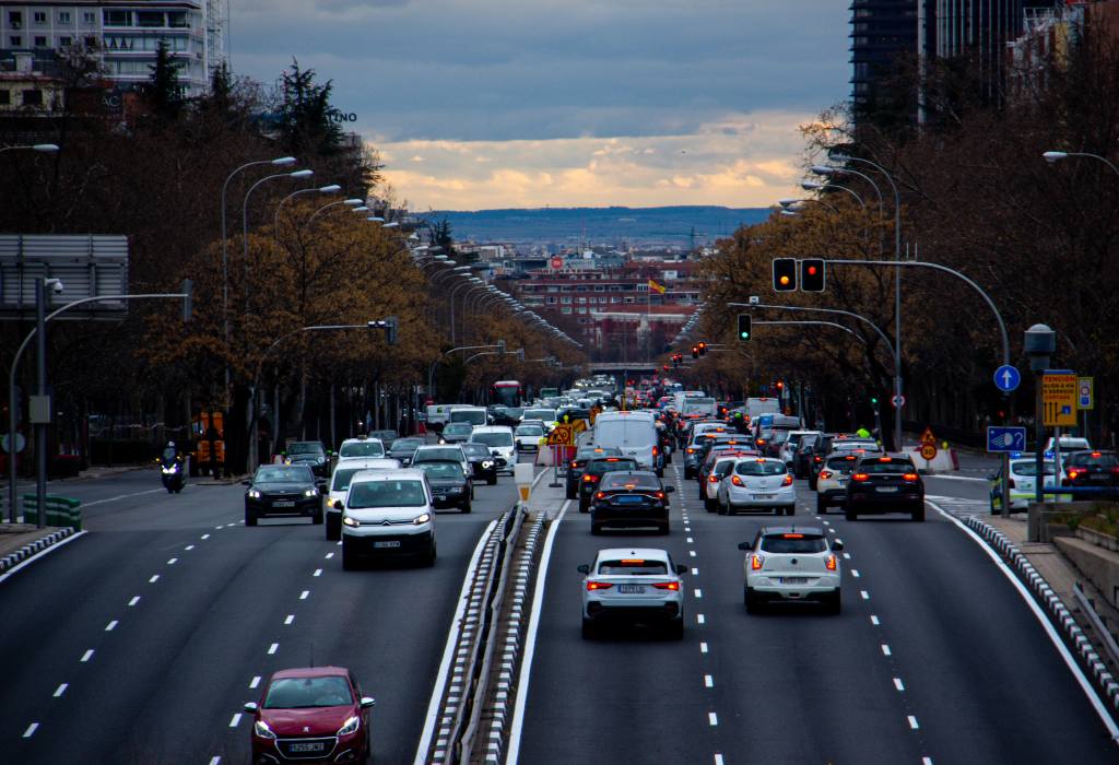 Cars on the highway at dusk.