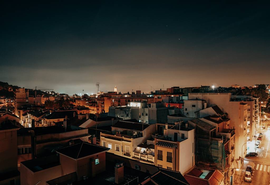 Malaga city lit up at night.
