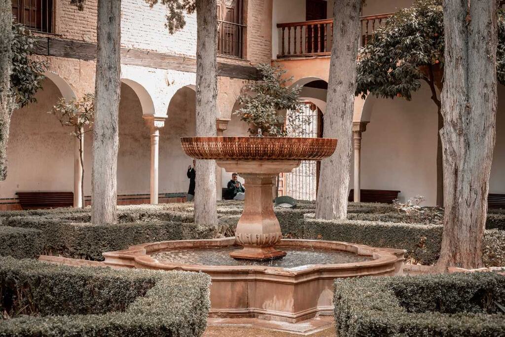 Fountain in palace courtyard garden