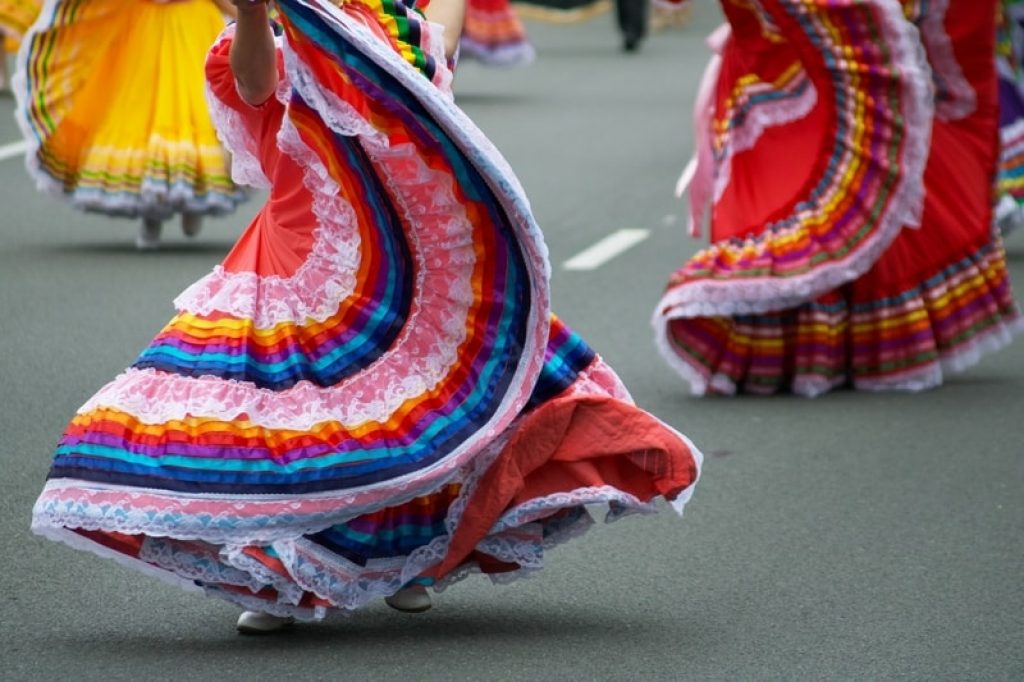 spanish flamenco dancers in colourful dresses