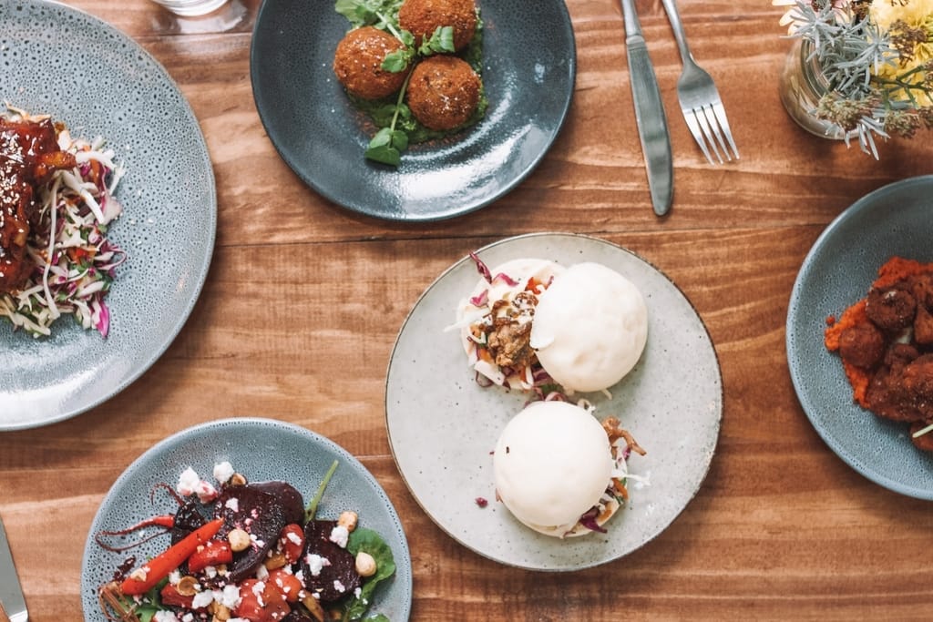 An aerial view of a table showing different types of food