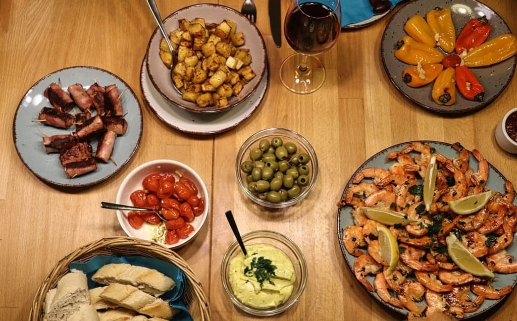 delicious tapas, dishes, olives, peppers,hummus