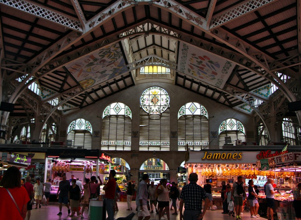 People walking through the Valencia Central Market