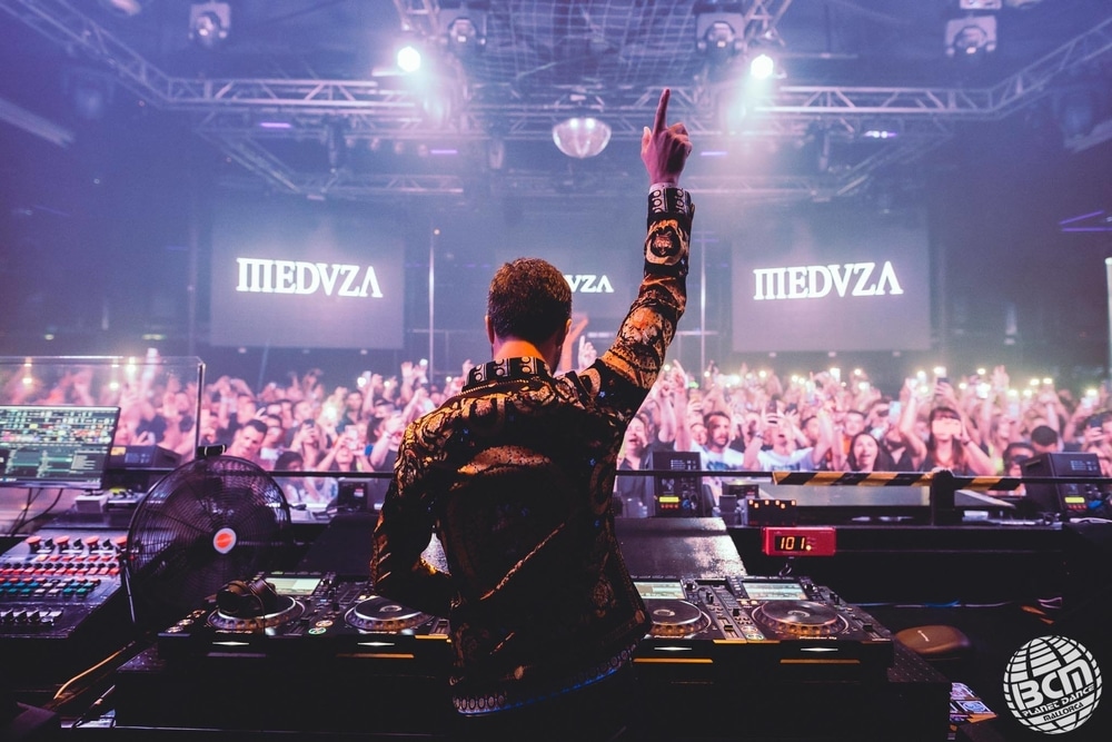 Crowd cheering the DJ