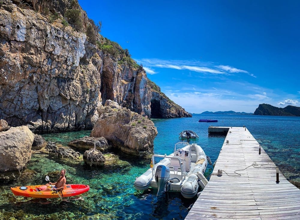 Boat and kayak on the ocean